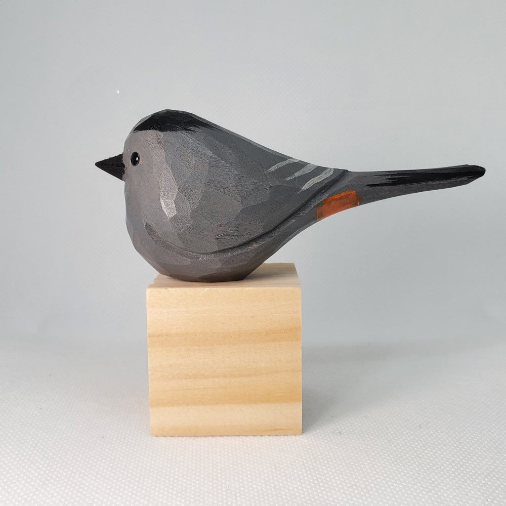 Catbird on Stand